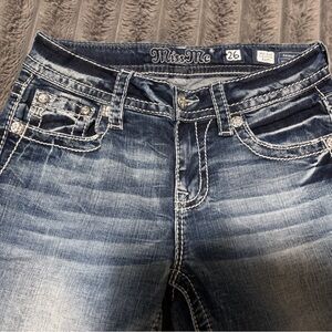 Miss Me Dark Blue Mid-Rise Bootcut Jeans. SZ26